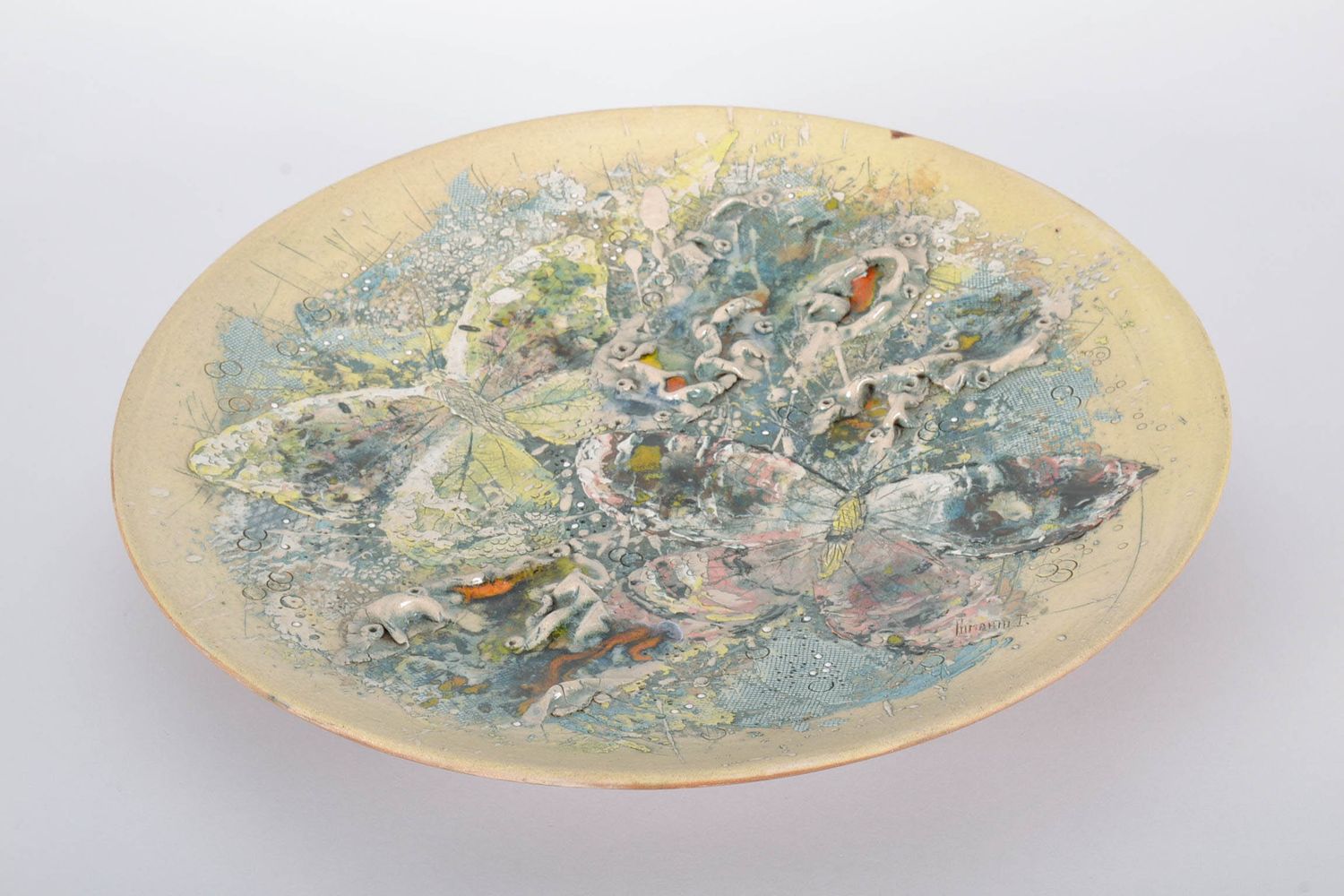 Декоративная тарелка из глины фото 2
