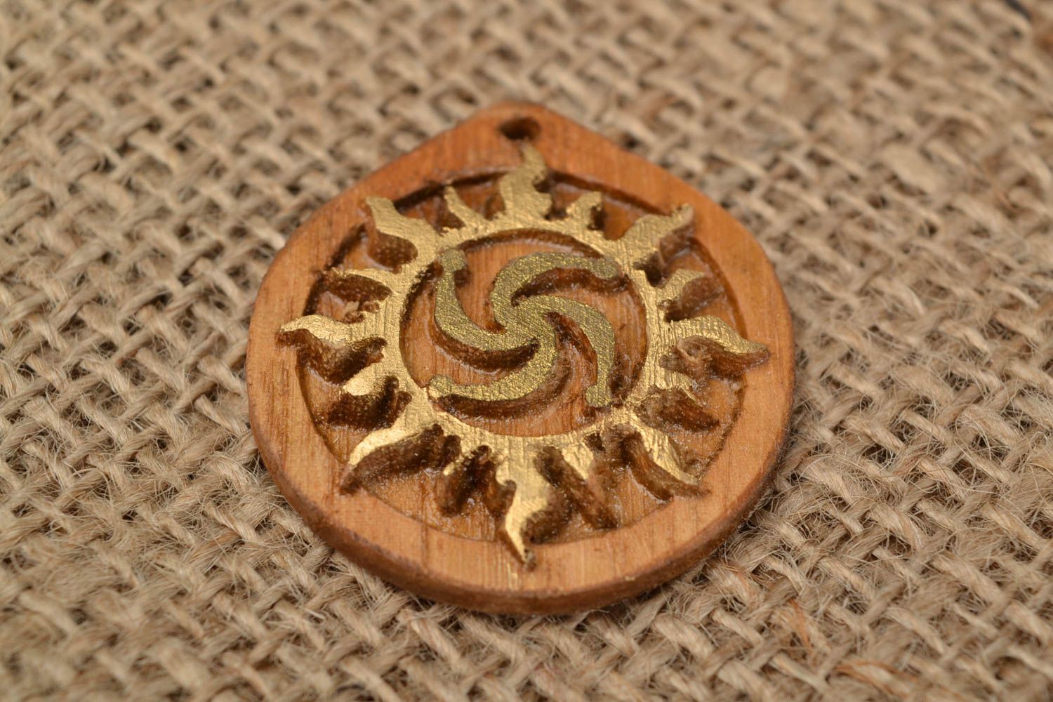 Slavonic beautiful handmade round pendant amulet made of wood Rod in the Sun photo 1