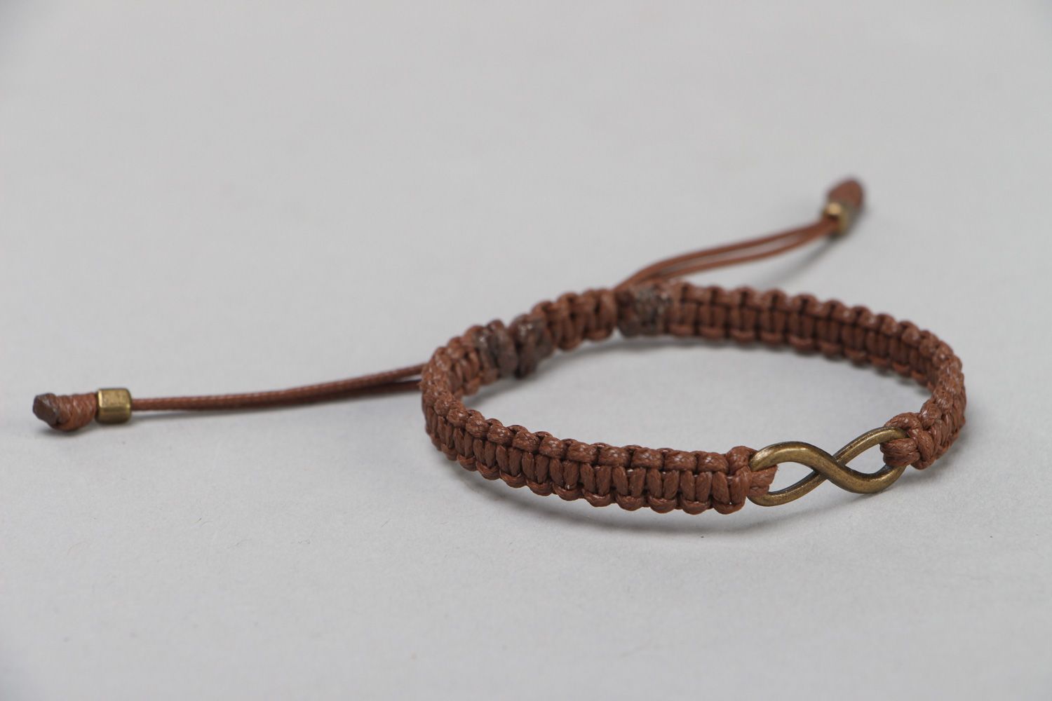 Handmade brown woven waxed cord bracelet photo 1
