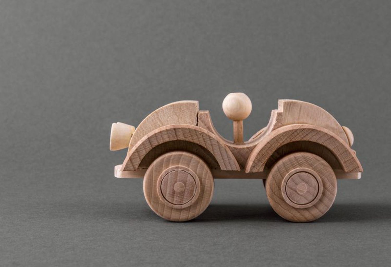 Toy car made of wood photo 2