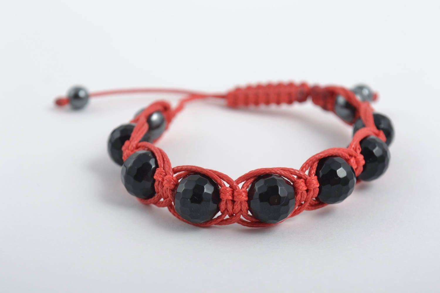 Black beads strand bracelet gemstone jewelry on red card photo 3