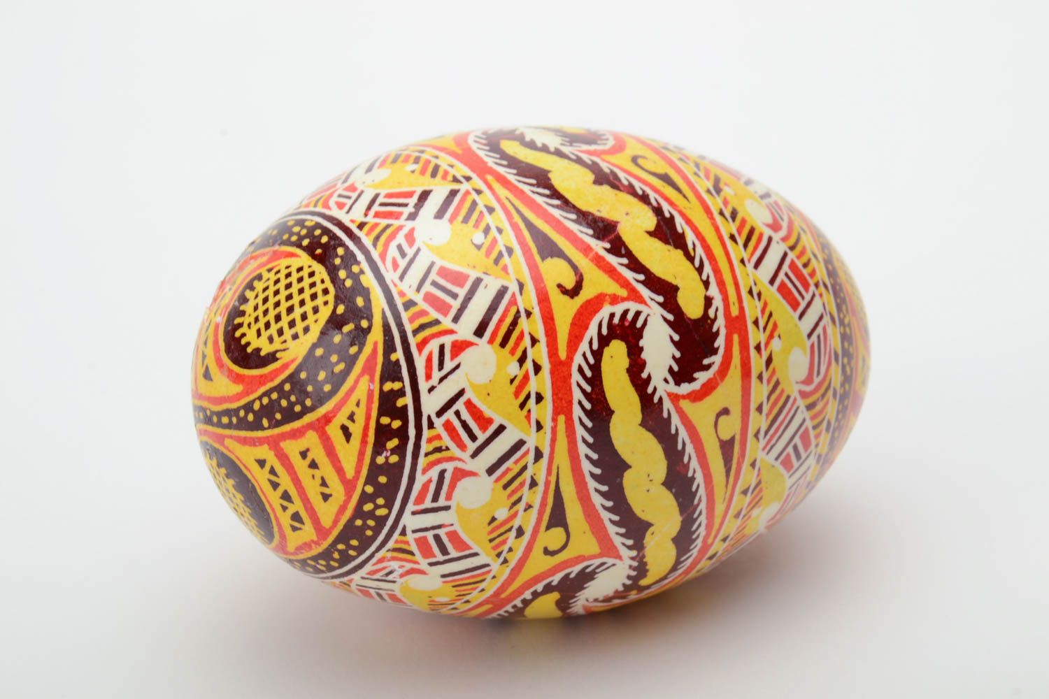 Homemade designer decorative Easter egg pysanka painted with wax and aniline dyes photo 4