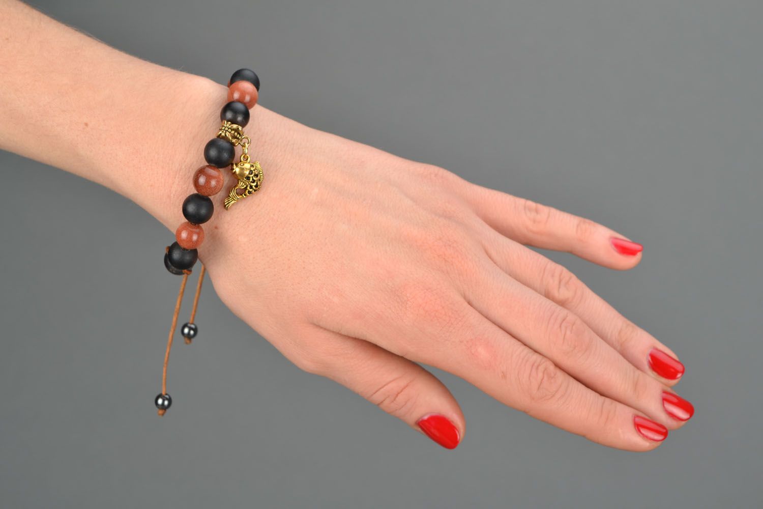 Handmade bracelet with natural stones Goldfish photo 1