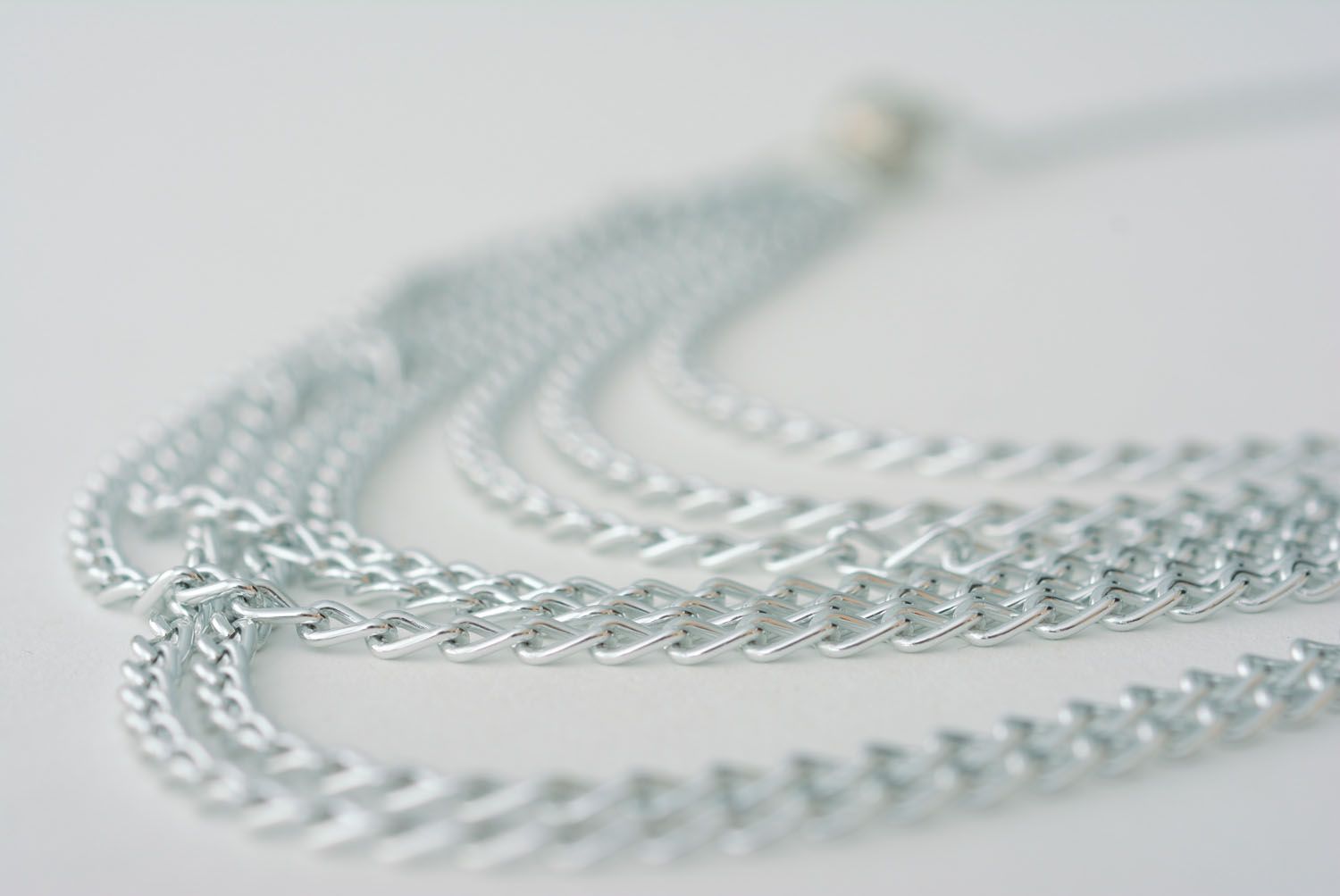 Women's necklace made of chains photo 4