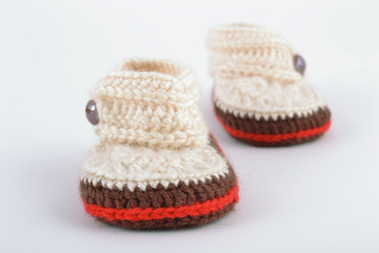 Light handmade knitted wool baby booties with beads and brown outsole photo 5