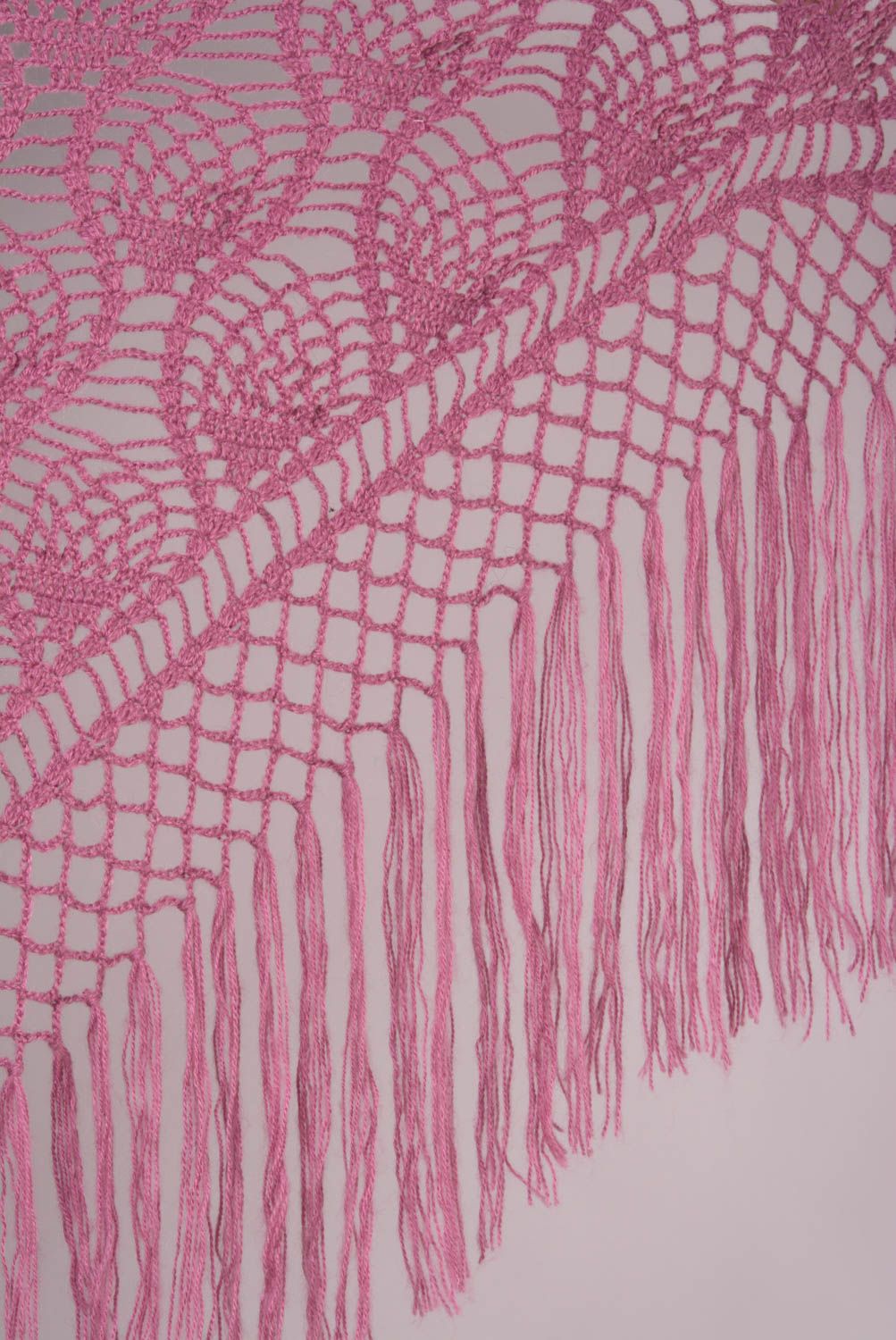 Handmade warm lace shawl knitted of woolen threads of pink color with fringe photo 3