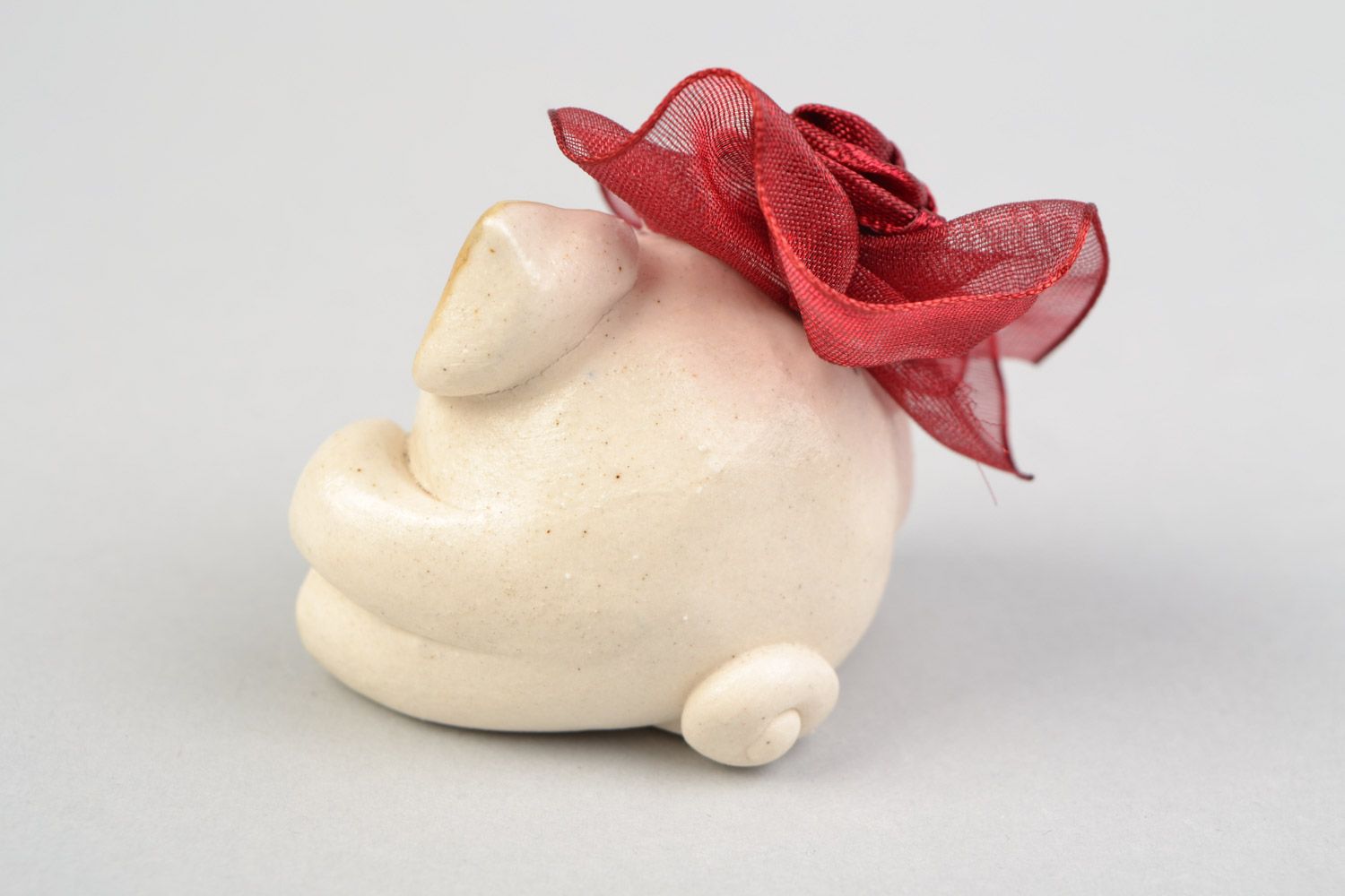 Funny small handmade porcelain statuette of pig with bow for decor photo 5
