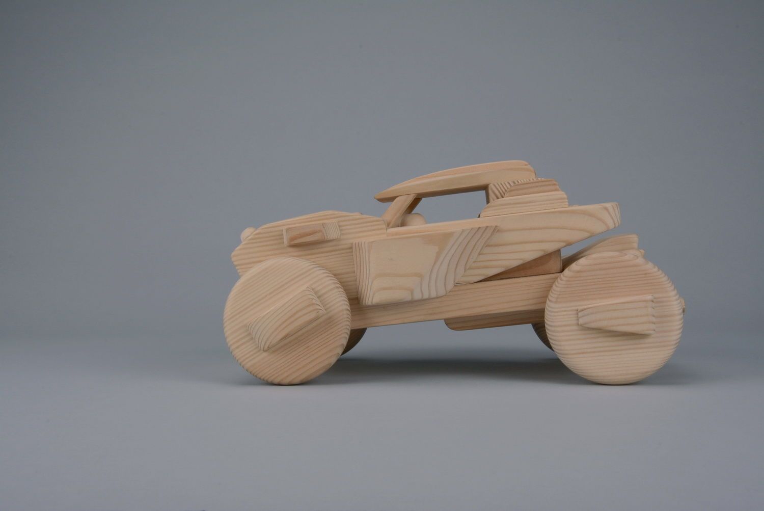 Little car made of wood photo 3
