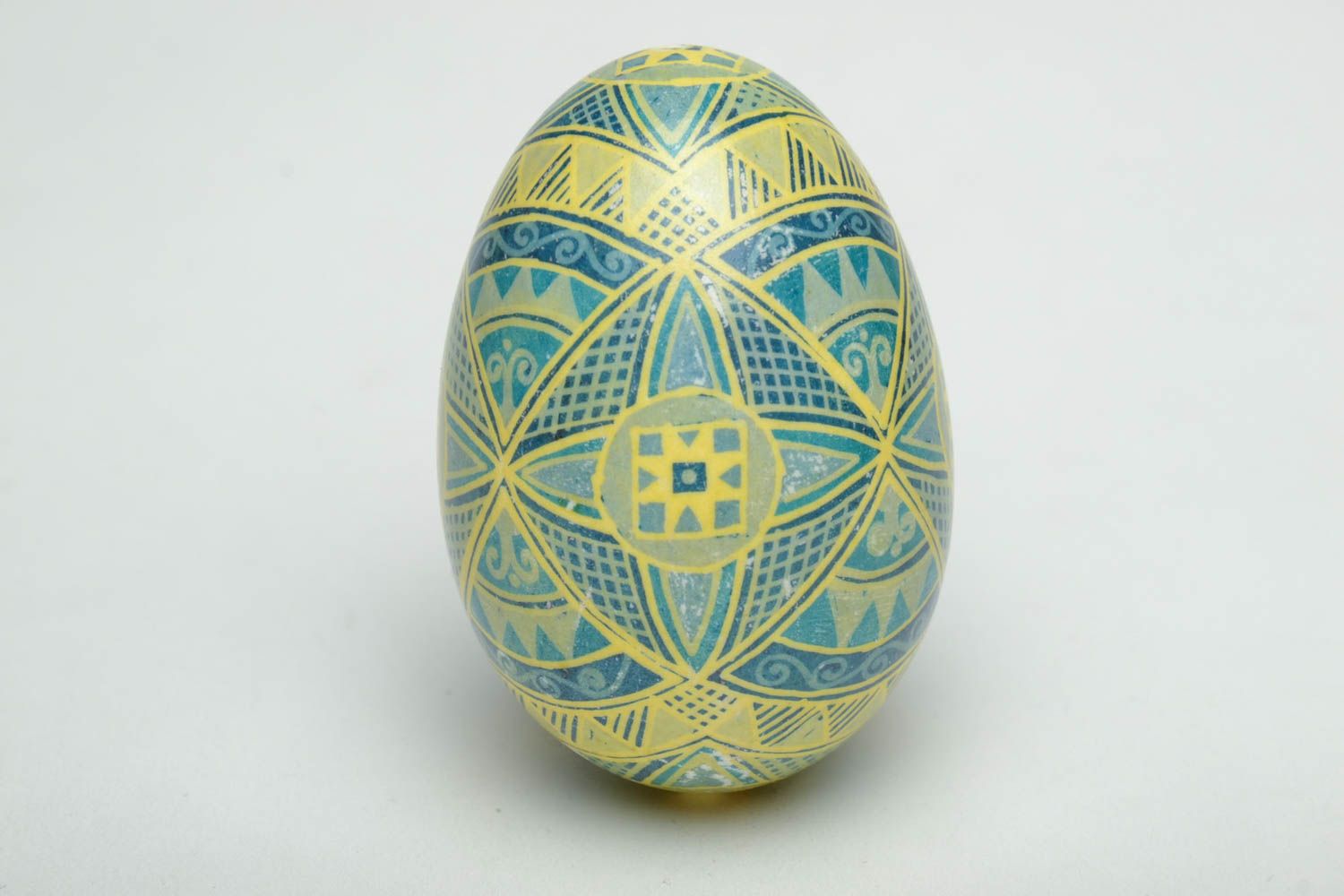 Easter egg with traditional symbolics painted with aniline dyes photo 2