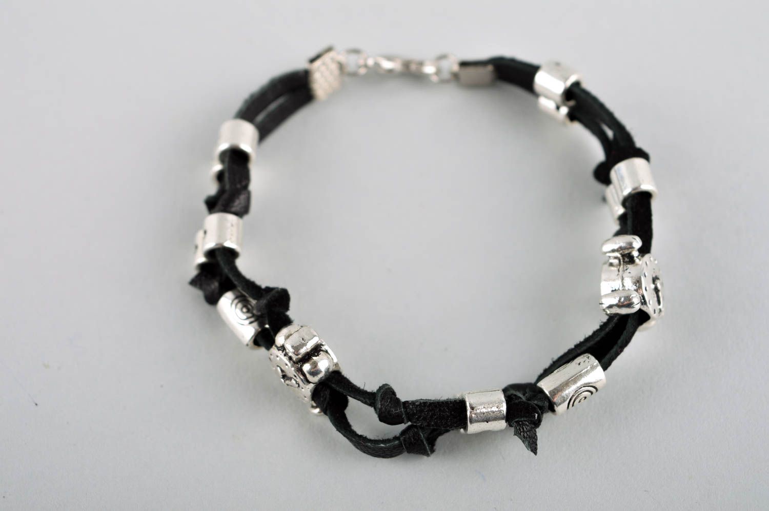 Handmade black cord bracelet with unisex metal charms and beads photo 2