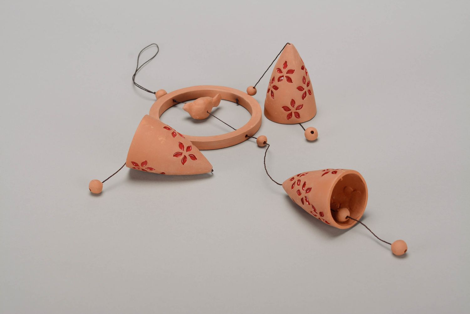 Clay bells with red flowers photo 3