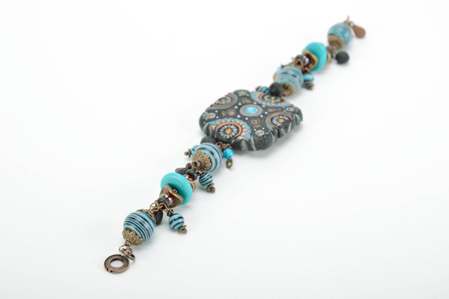 Bracelet made of black smoked ceramics, blue with turquoise photo 1