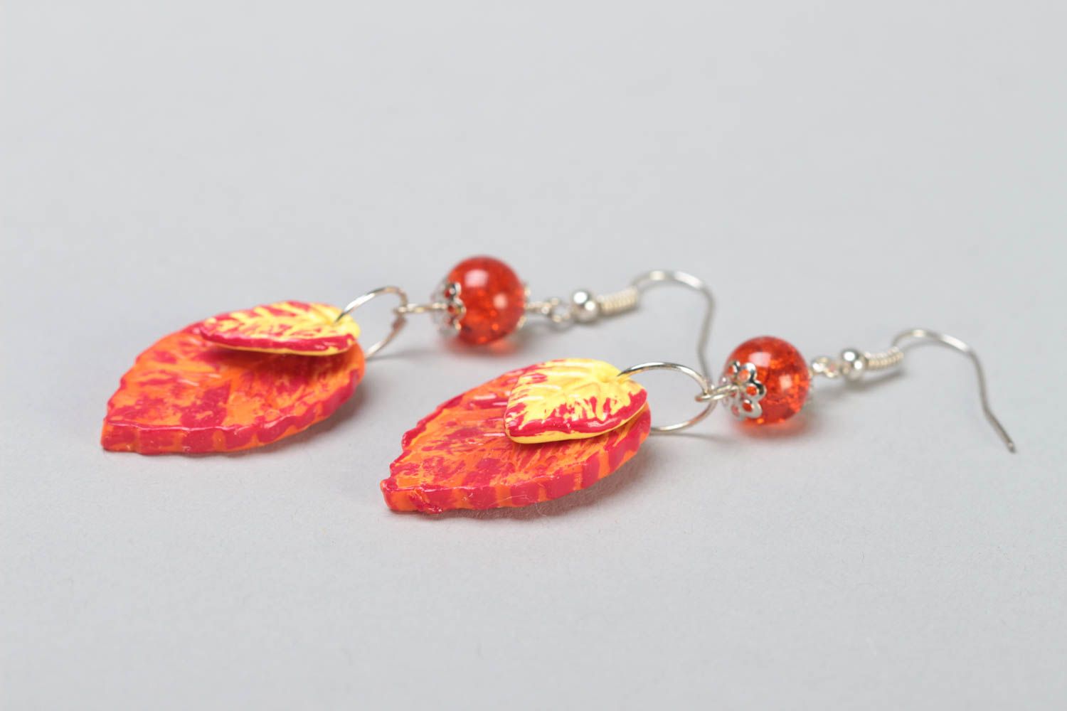 Handmade polymer clay dangling earrings with bright orange leaves with beads photo 3