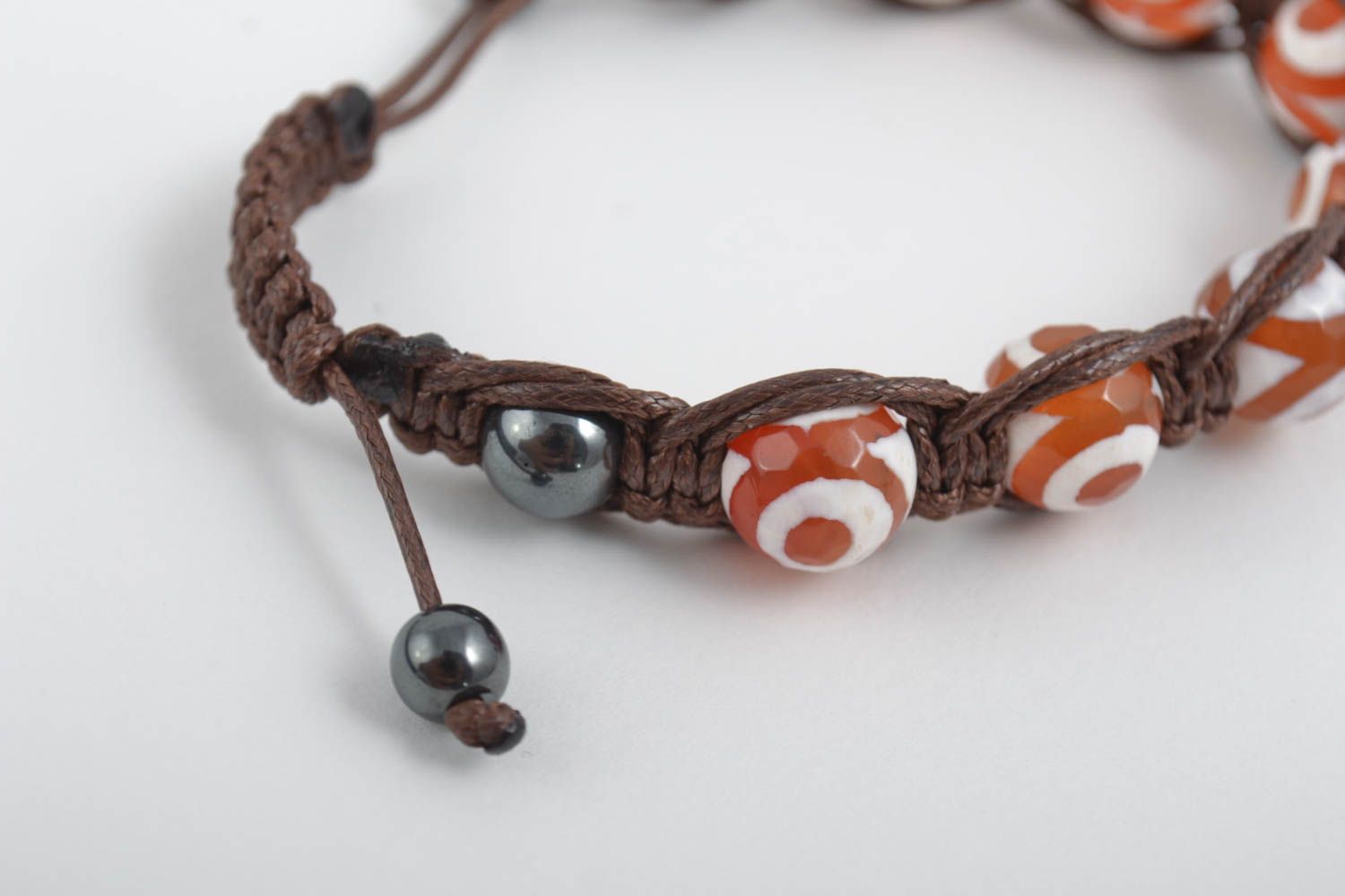 Strand beaded gemstone hematite and agate bracelet on brown cord photo 4