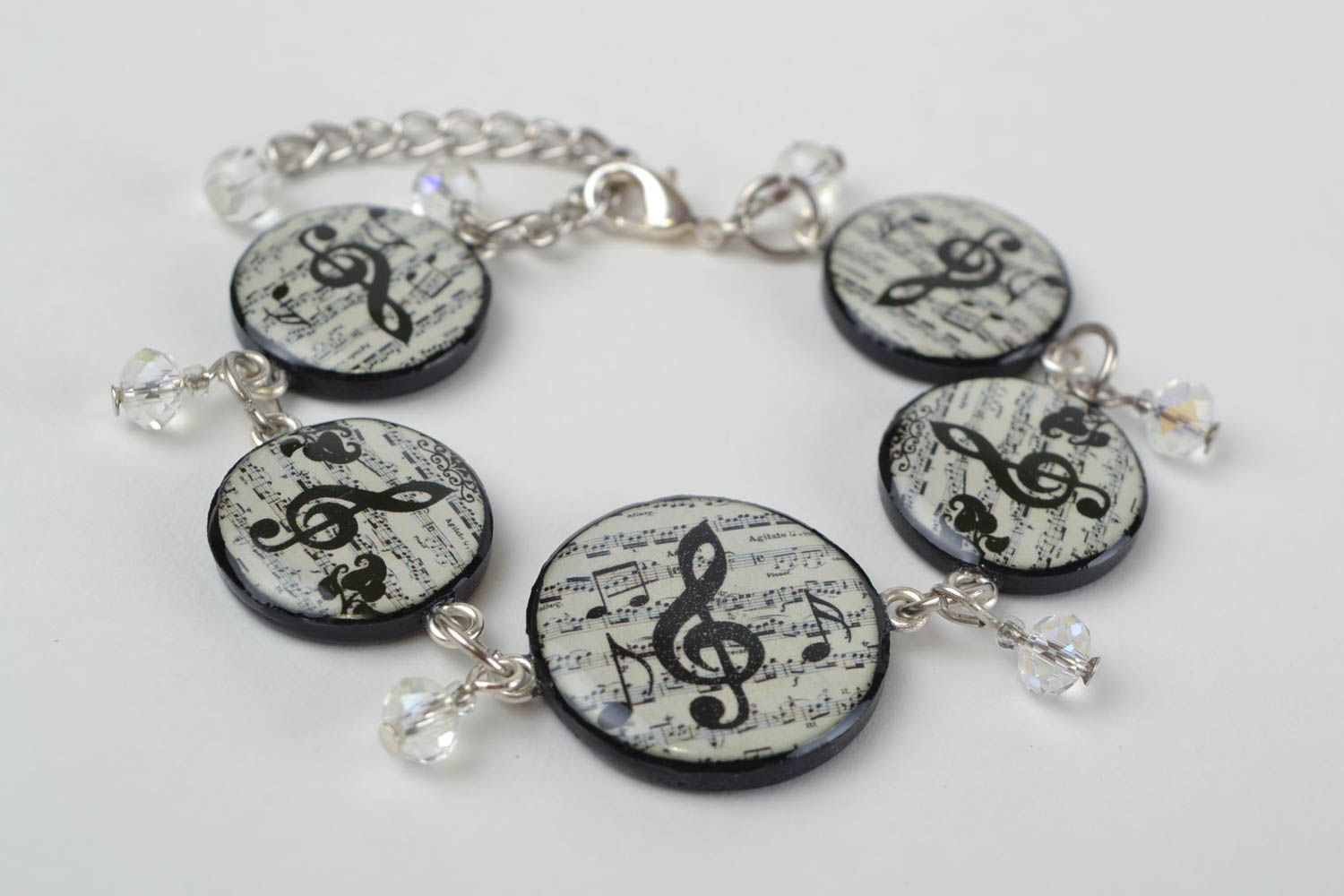 Handmade charm treble clef bracelet on a silver chain photo 1