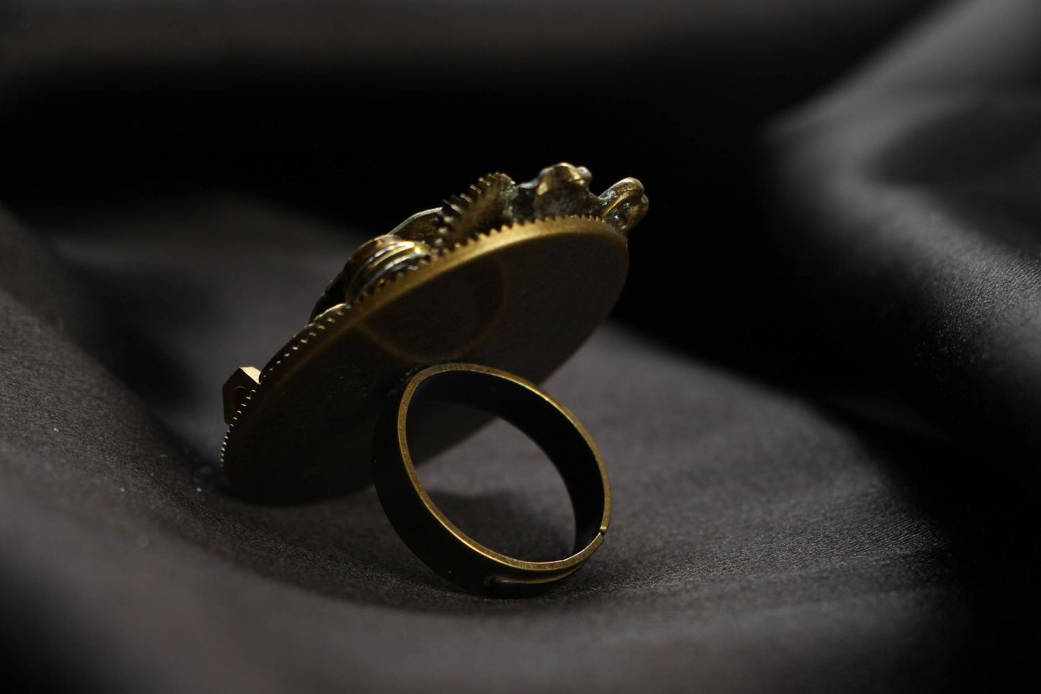 Large round metal ring in steampunk style photo 3