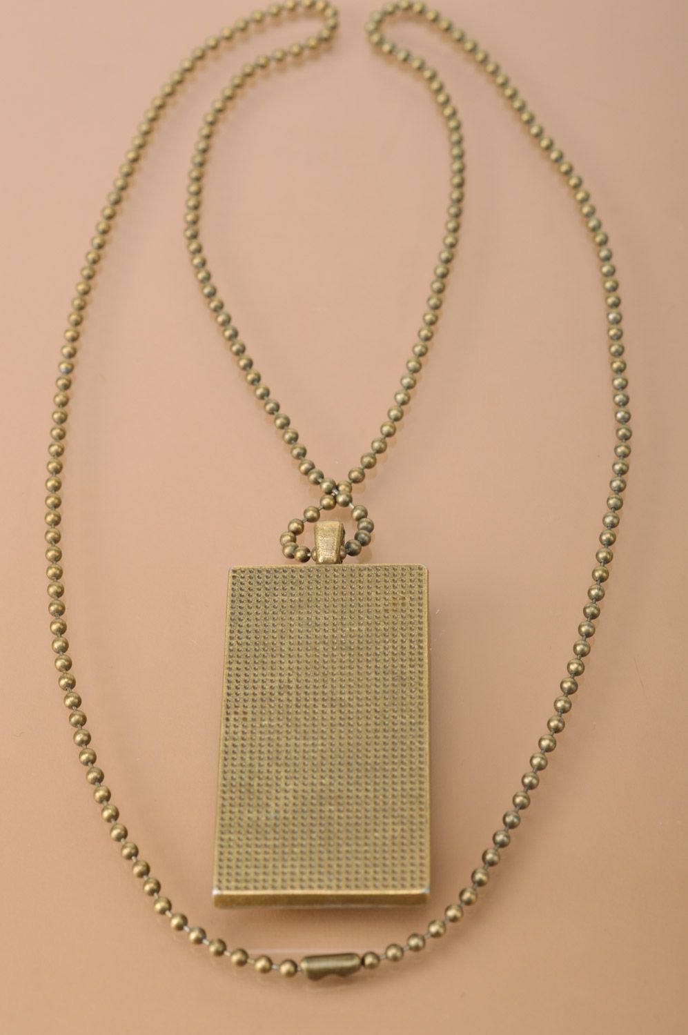 Handmade rectangular metal pendant in warm colors on long chain of bronze color  photo 5