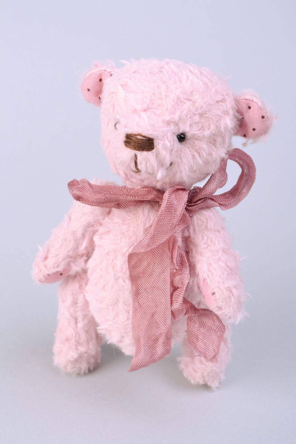 Small handmade designer soft toy bear of pink color with beautiful bow photo 3