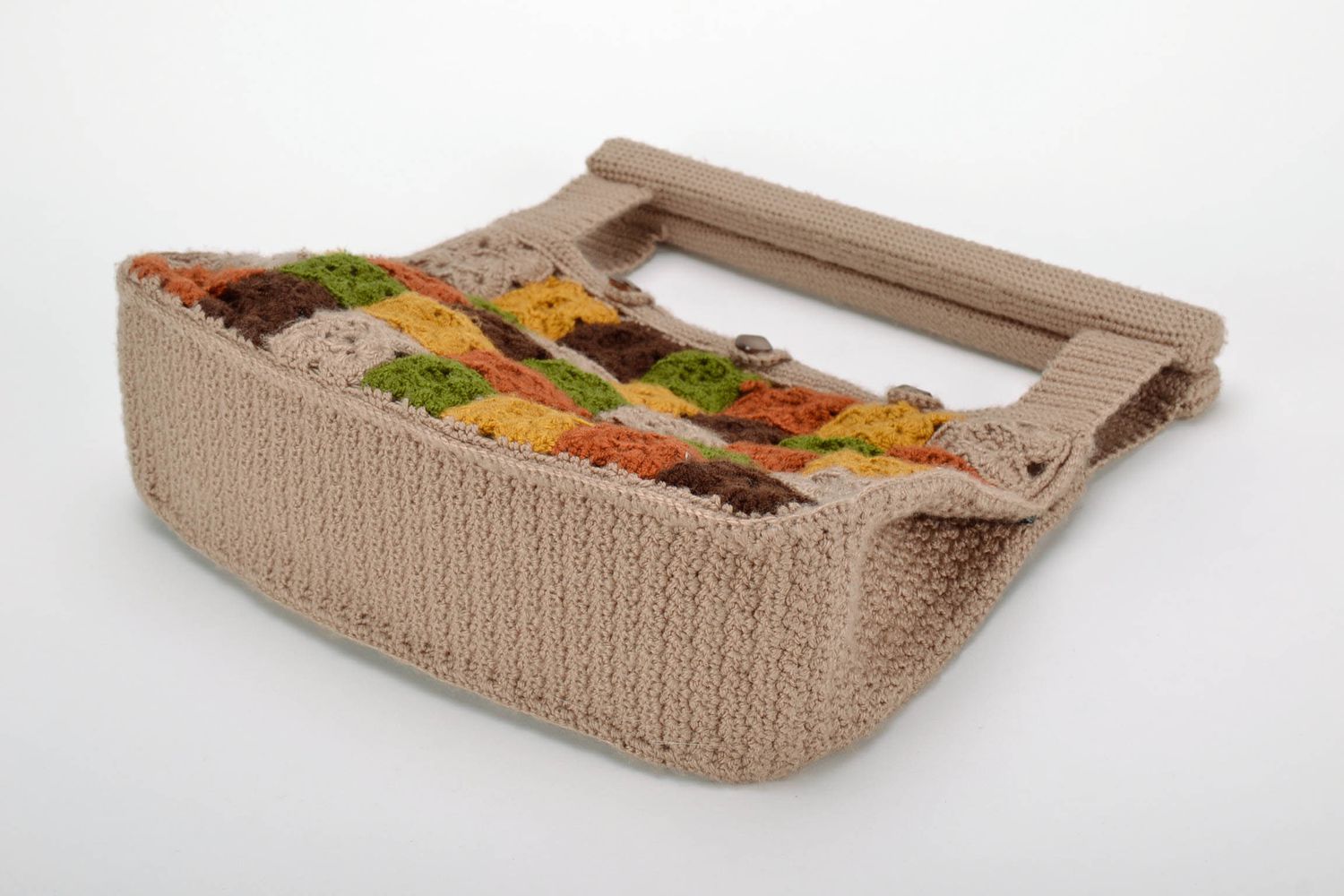 Knitted bag with wooden handles photo 4