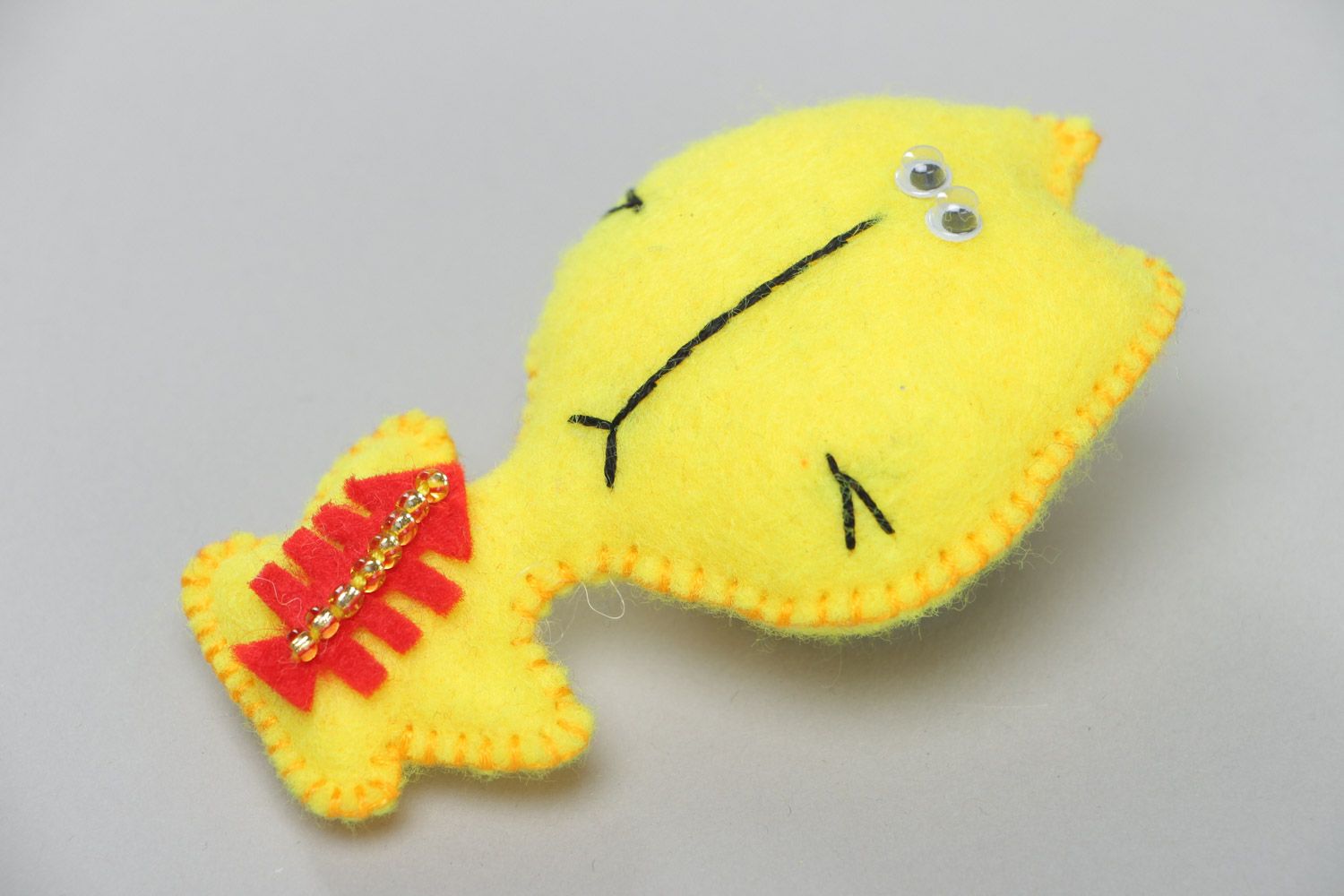 Handmade small brooch sewn of yellow fabric with applique work and beads Cat photo 2