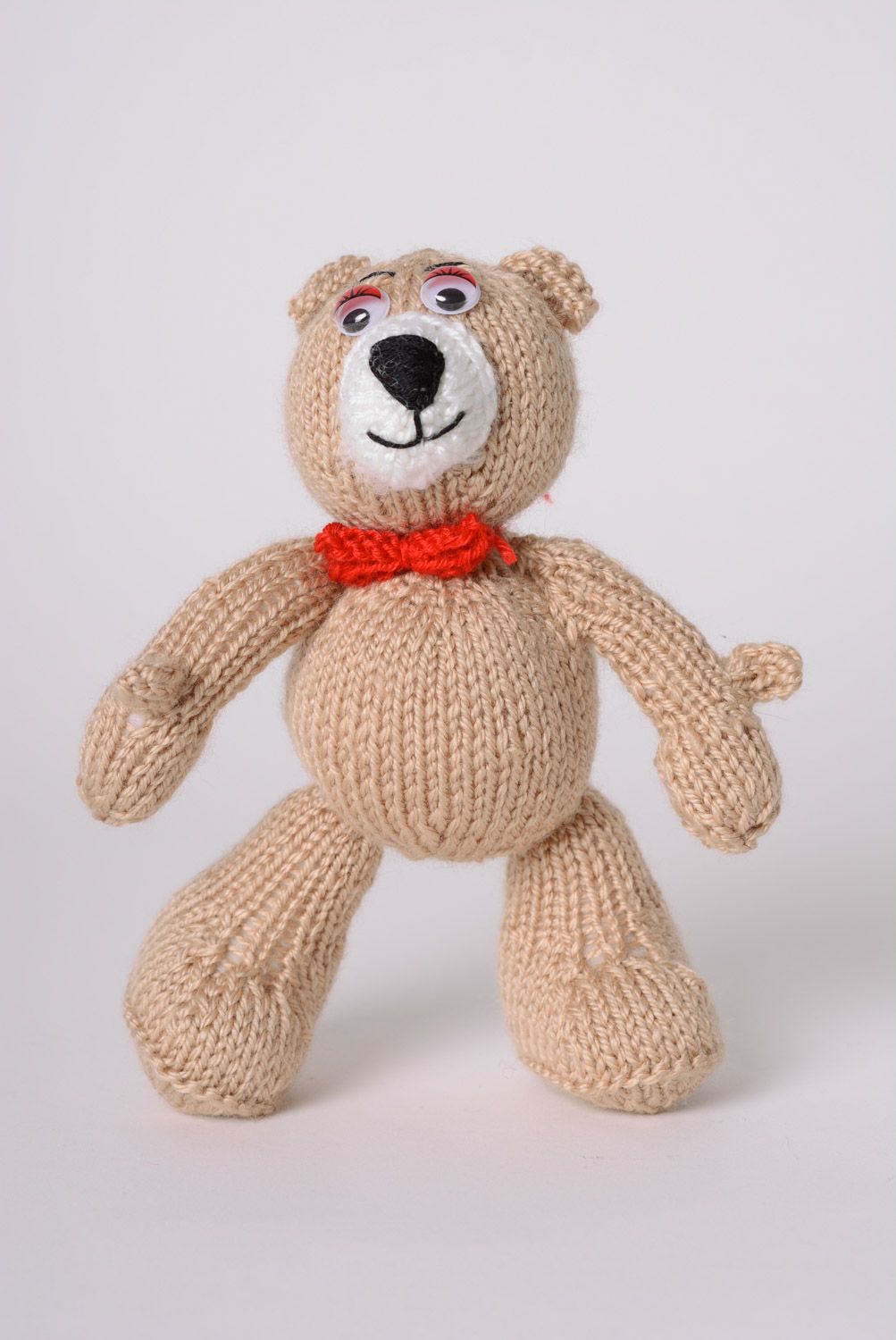 Nice homemade knit soft toy bear of beige color with bow photo 1