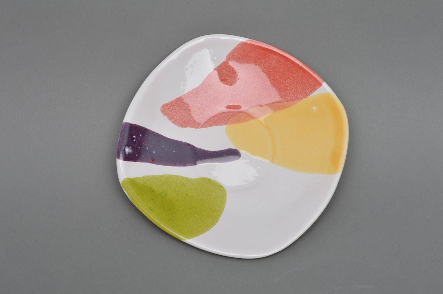 Handmade porcelain saucer with colored glaze painting with abstract pattern photo 2