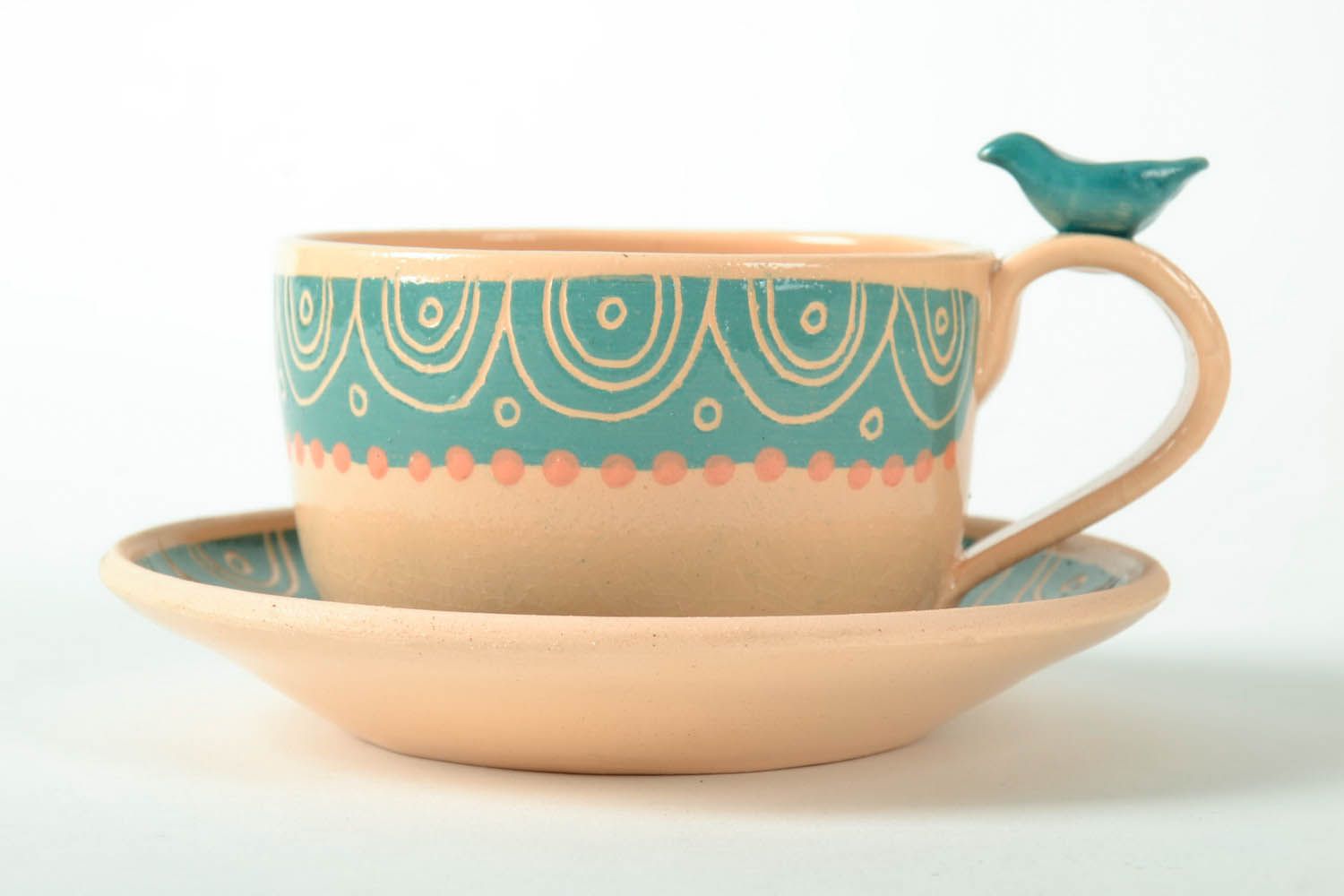 Tasse à thé avec soucoupe en argile faite main photo 2