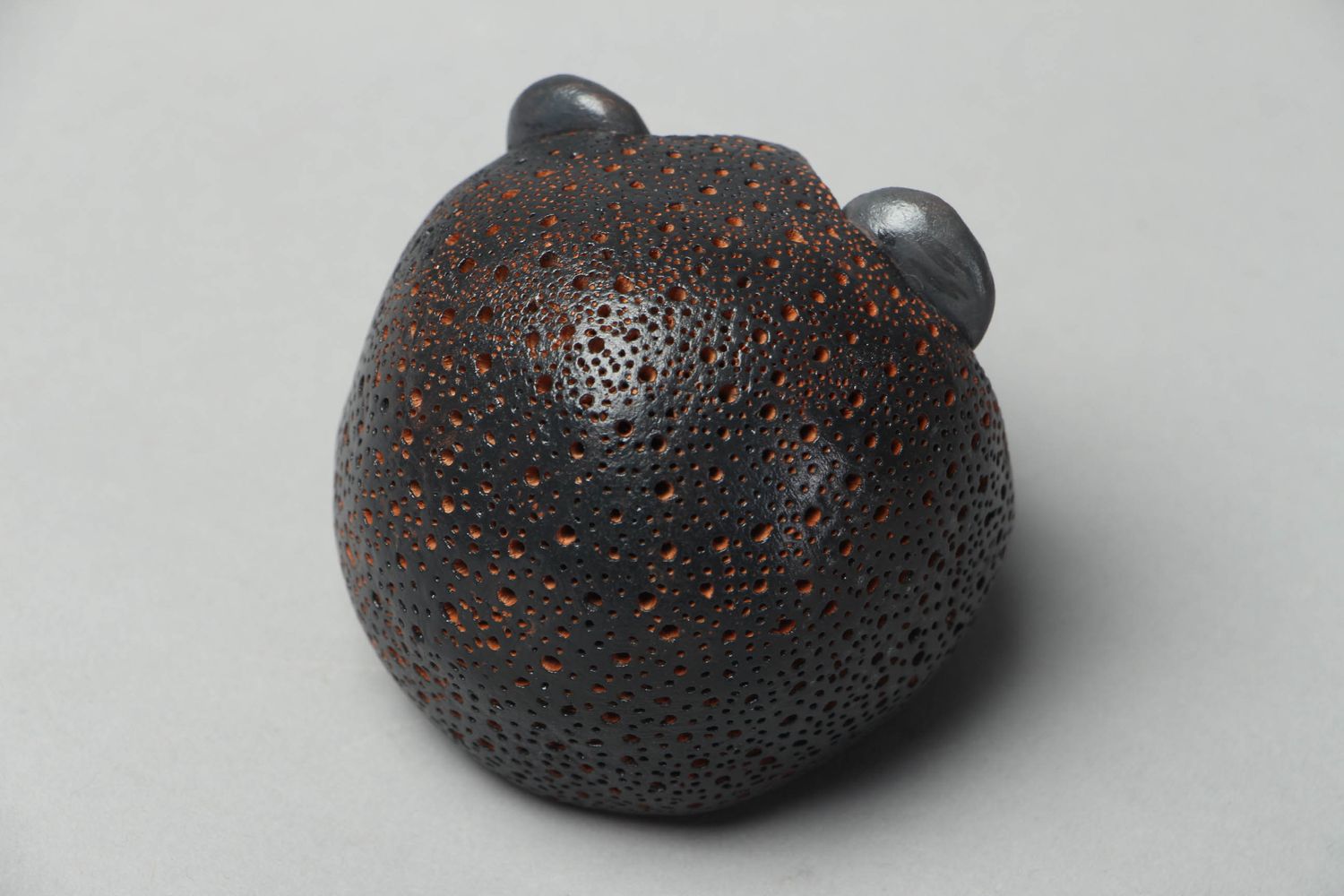 Clay statuette of black hedgehog photo 2