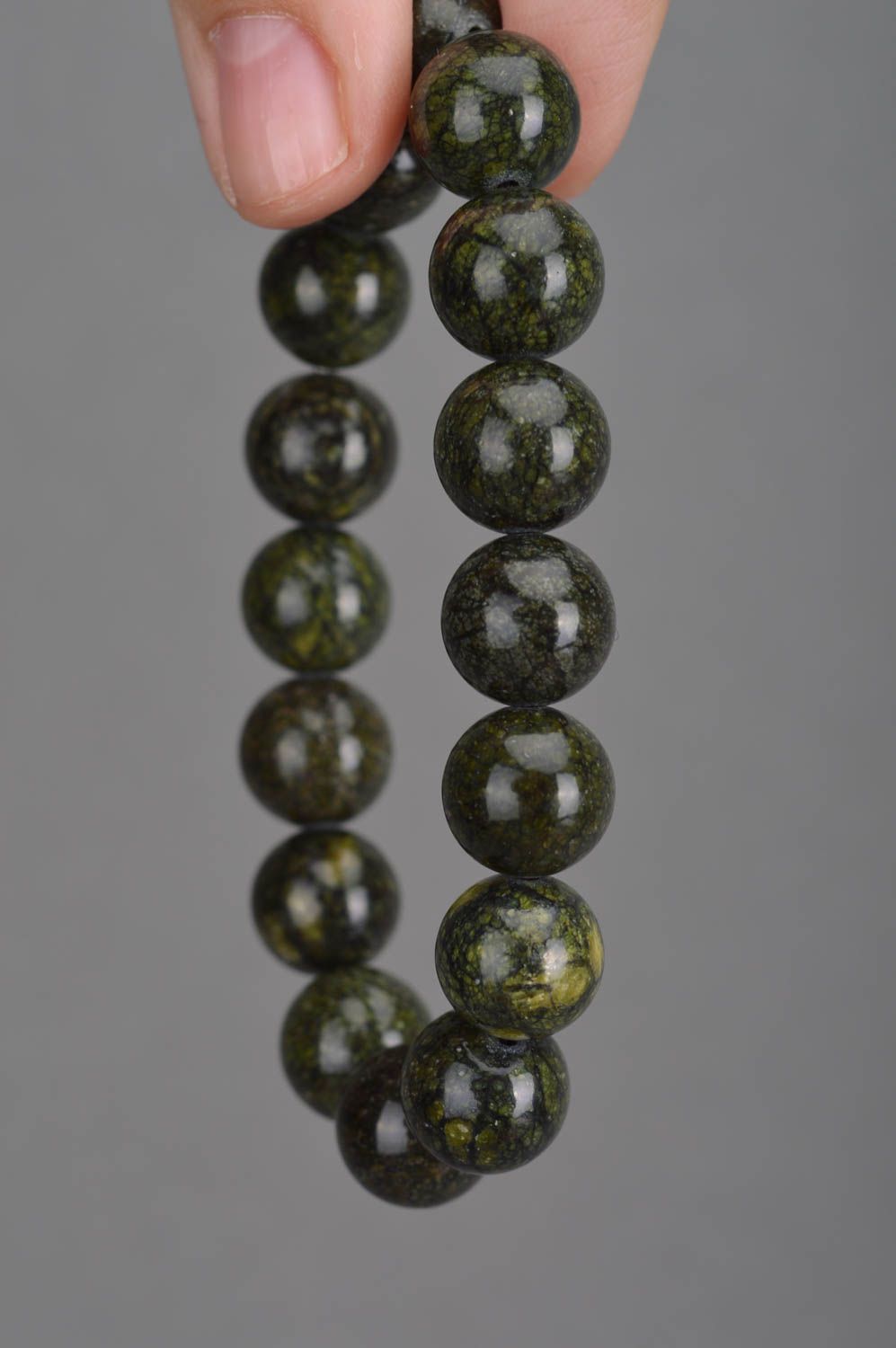 Designer handmade wrist women's bracelet with beads of moss green color photo 3