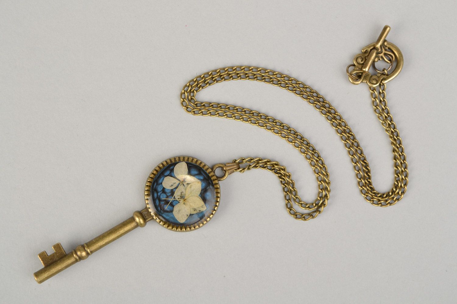 Handmade botanical pendant on long chain with hydrangeas flower coated with epoxy photo 3
