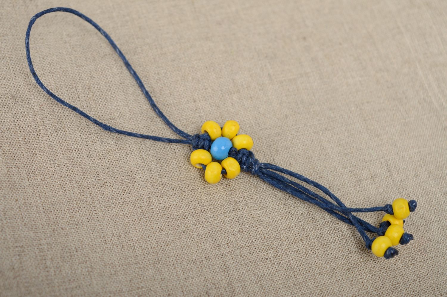 Macrame keychain with yellow wooden beads photo 2