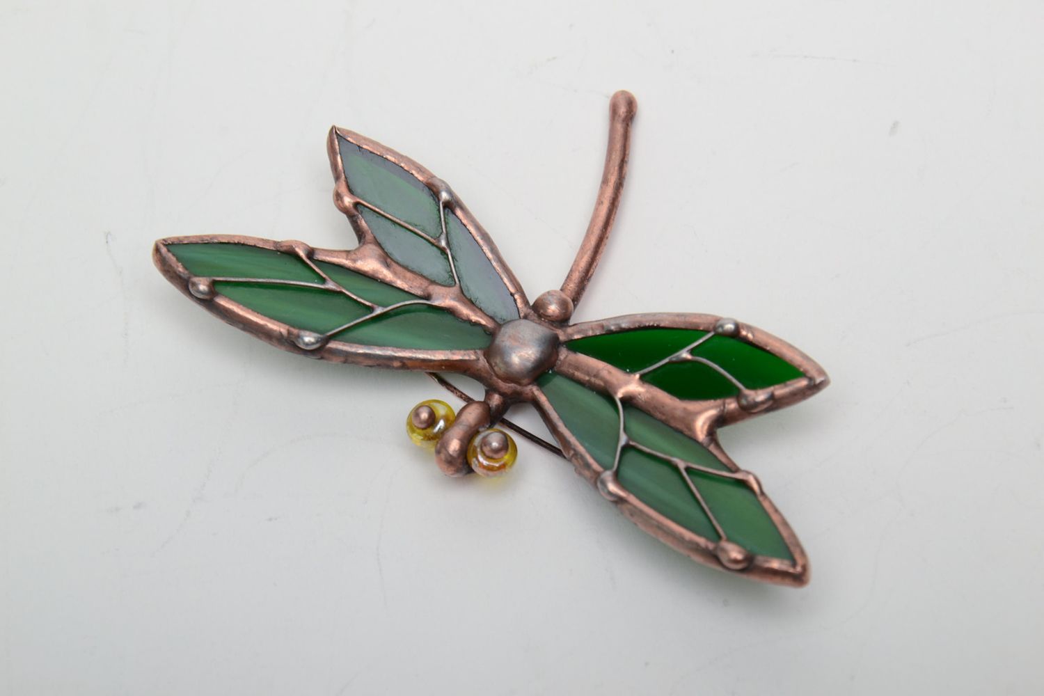 Stained glass brooch in the shape of dark green dragonfly photo 3