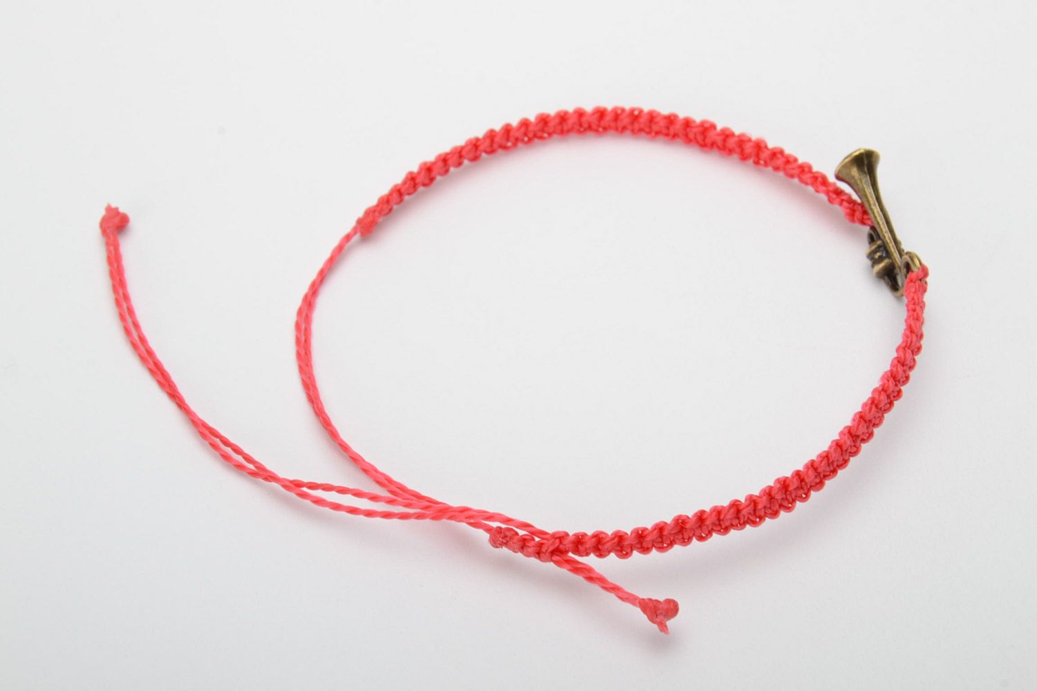 Handmade red woven capron thread bracelet with metal charm in the shape of saxophone photo 4