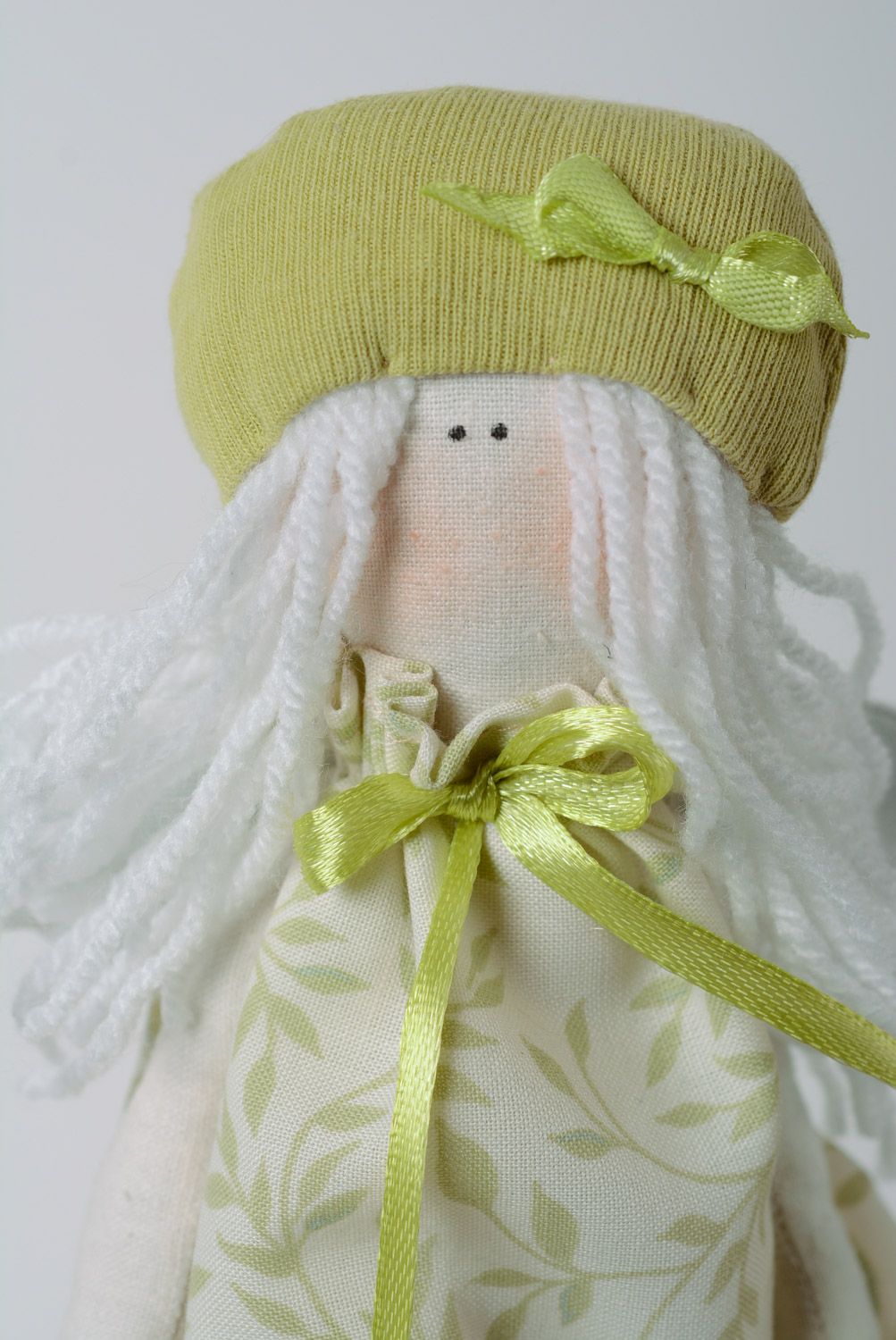 Handmade soft toy sewn of cotton in the shape of angel in light color palette photo 2