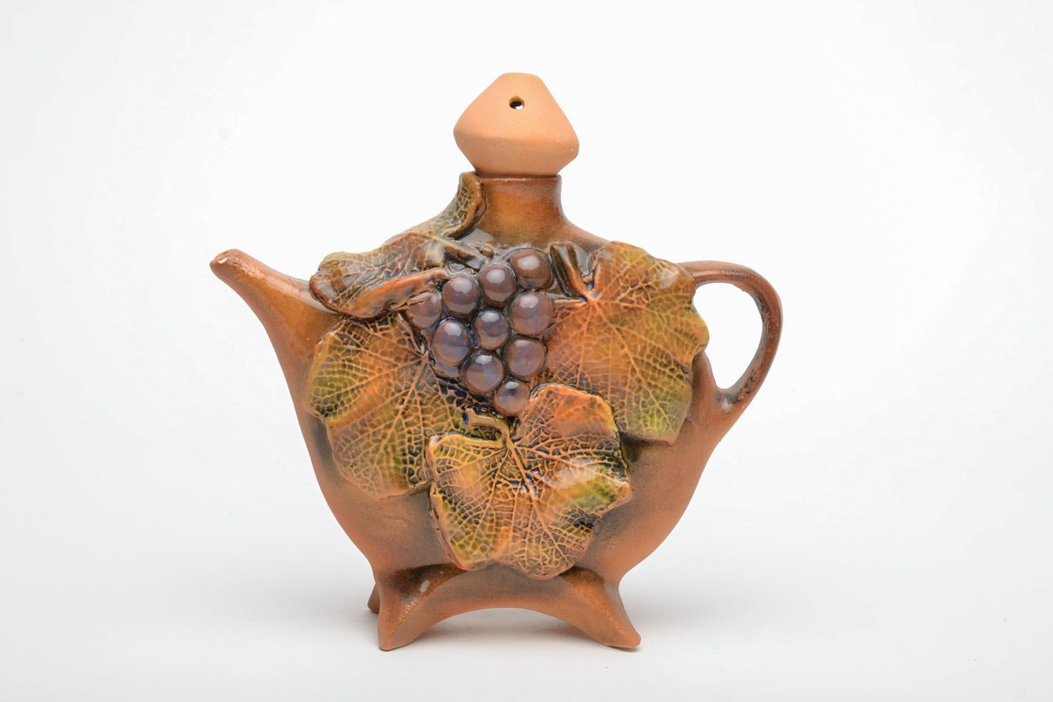 Clay teapot with grape clusters photo 2