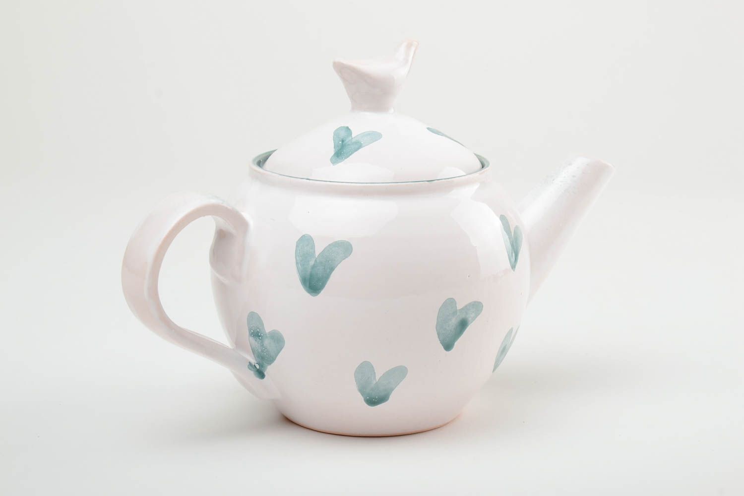 Beautiful handmade glazed ceramic teapot of white color with hearts 500 ml photo 4