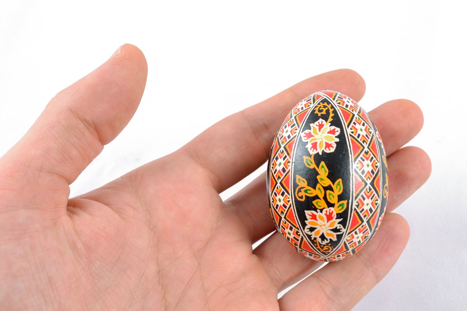 Chicken Easter egg of black color with colorful ornament photo 4
