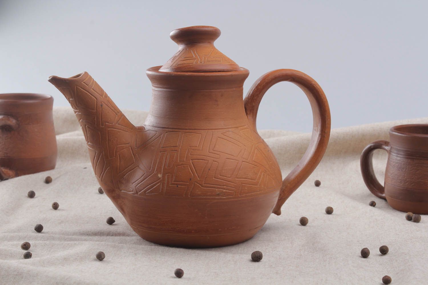 Bule de cerâmica decorativo com tampa feito à mão chaleira de argila artesanal  foto 1