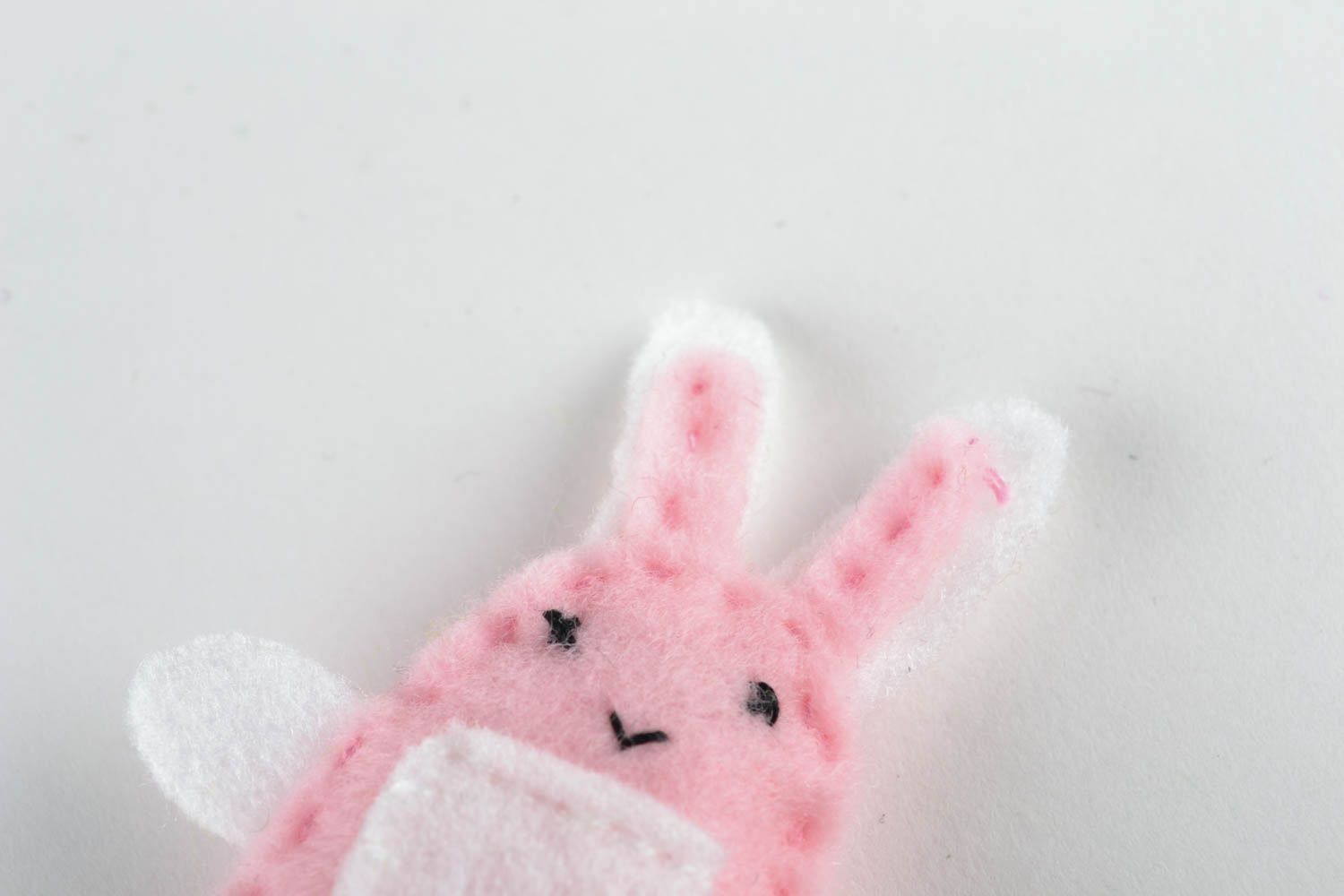 Toy earphone cord holder in the shape of pink hare photo 3
