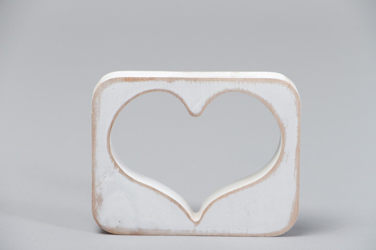 Small handmade plywood table decoration of white color in the shape of heart  photo 2