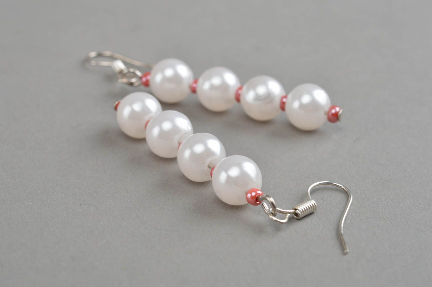 Handmade female earrings festive white beaded jewelry stylish accessories photo 3