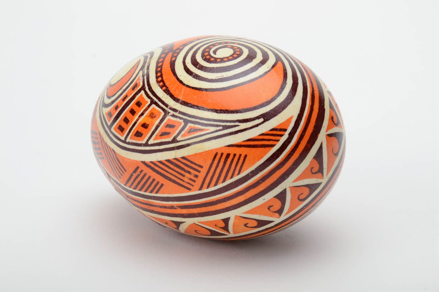 Unusual handmade orange painted Easter egg decorated using waxing technique photo 4