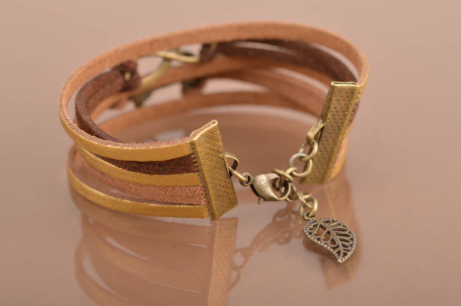Beautiful homemade suede cord bracelet with metal inserts and charm for girls photo 5