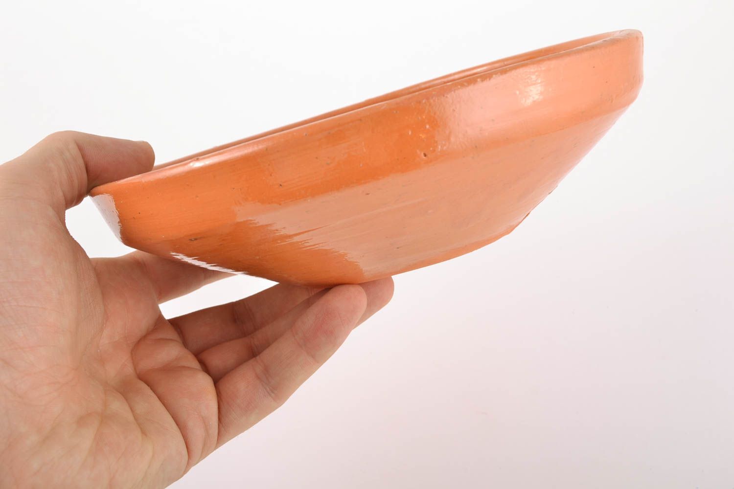 Glazed ceramic bowl made using engobes ornamenting technique photo 4