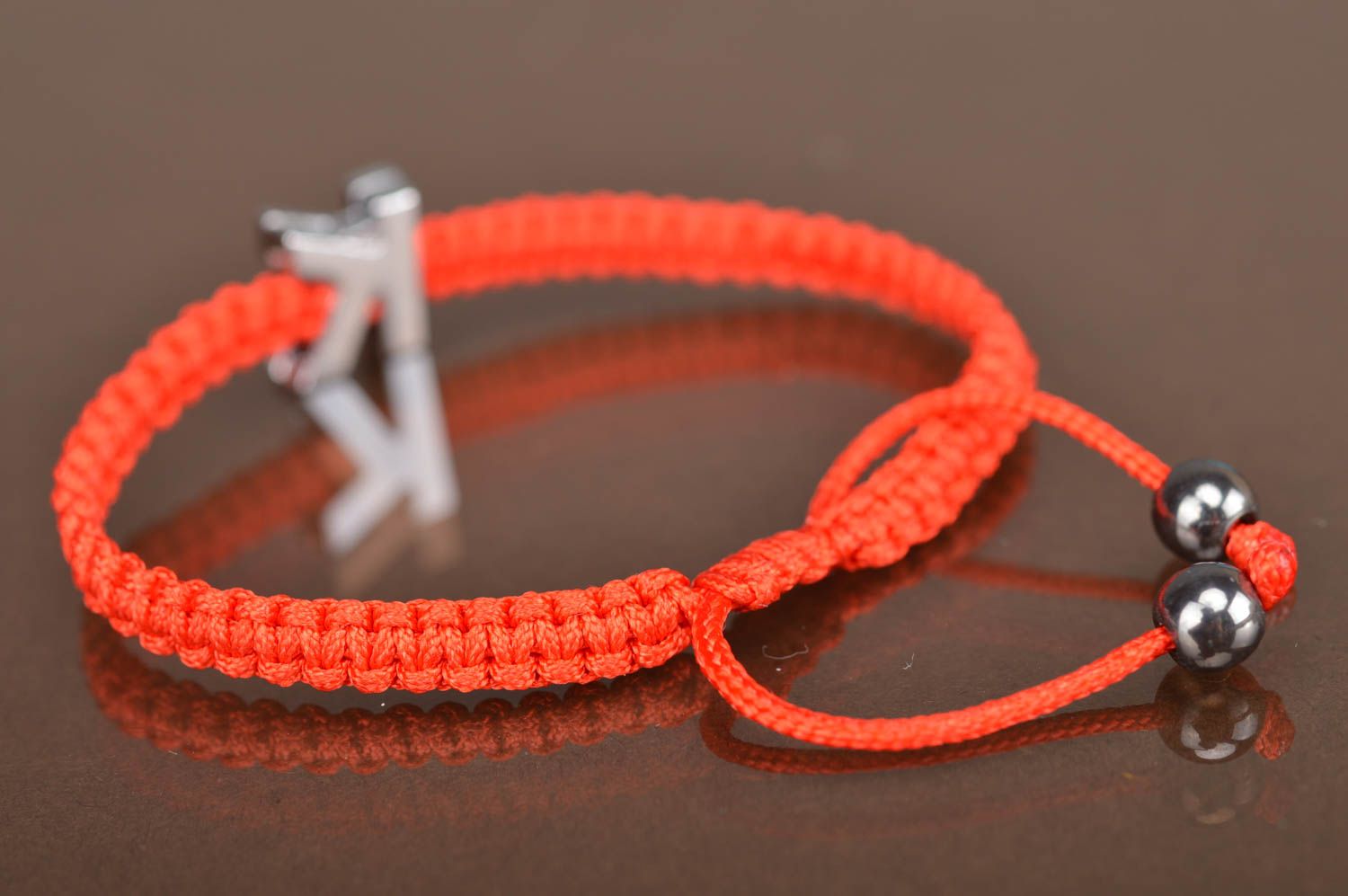 Simple woven handmade beautiful bracelet with letter K made of textile laces photo 4