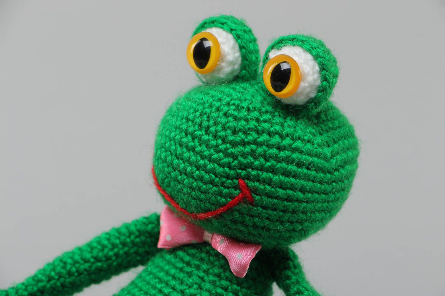 Handmade soft toy crocheted of acrylic threads bright green frog with bow tie photo 3