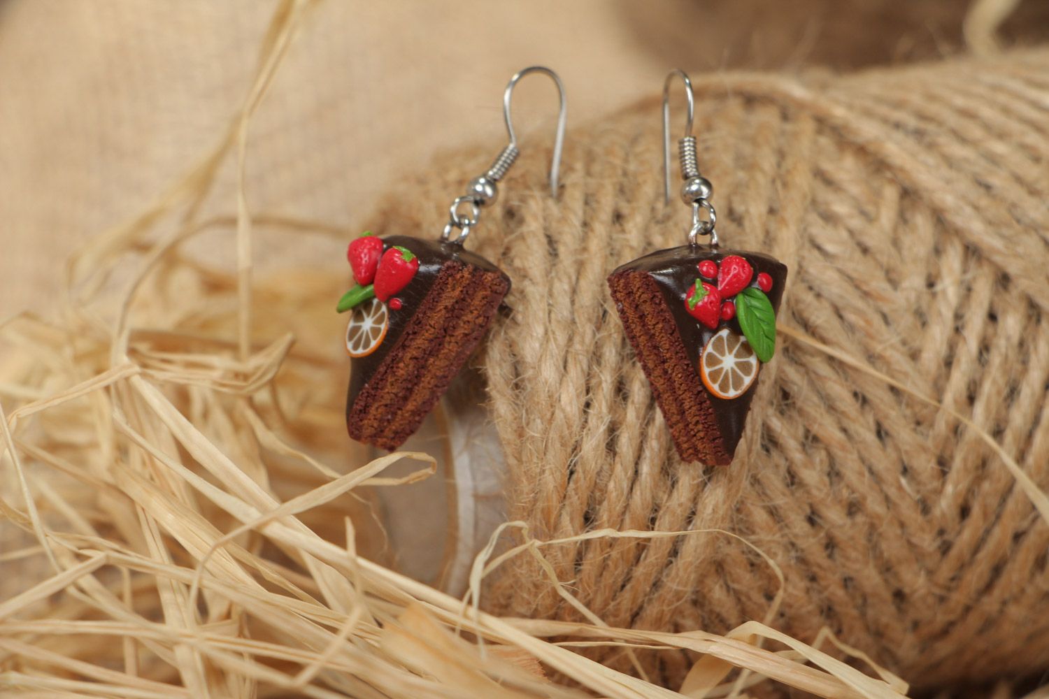 Handmade polymer clay earrings in the shape of pieces of brown cakes  photo 1