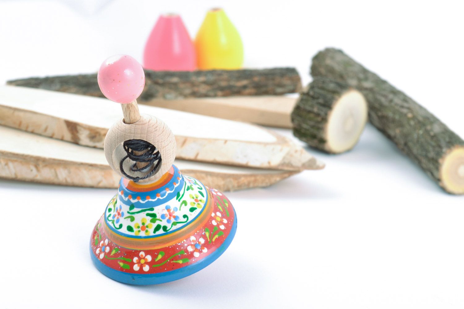Handmade wooden decorative toy painted spinning top made of natural materials  photo 1
