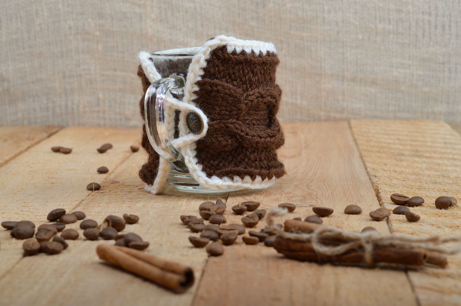 Cute handmade cup cozy knitted of brown woolen threads with metal key charm photo 5