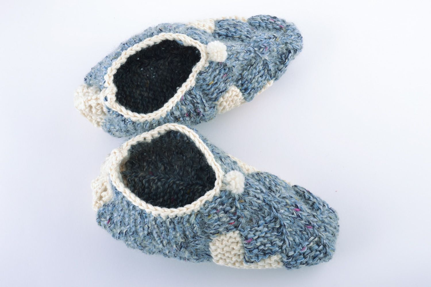 Beautiful warm handmade knitted half-woolen slippers of blue color photo 2
